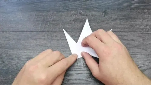 跟着视频揭秘千纸鹤折叠技巧，轻松学会，百度收录上榜标题！